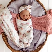 Snuggle Hunny Organic Muslin Wrap - Carousel